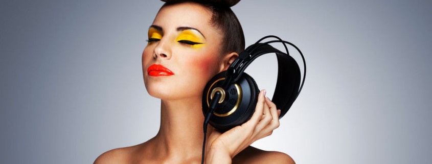 beautiful girl holding headphones